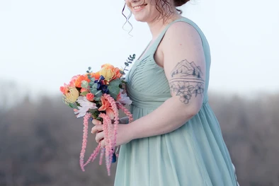 A bridesmaid photo, taken by a light & airy Omaha wedding photographer