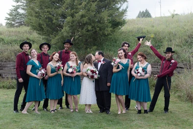 Bridesmaids and groomsmen during a wedding in Omaha, NE