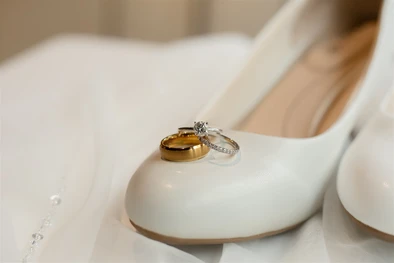 Wedding rings & shoes, taken by a light & airy Omaha wedding photographer