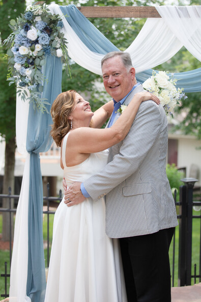 Smiling Omaha bride & groom